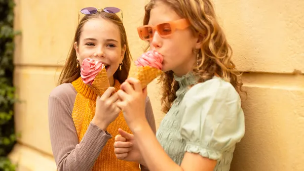 Children eating ice cream cones