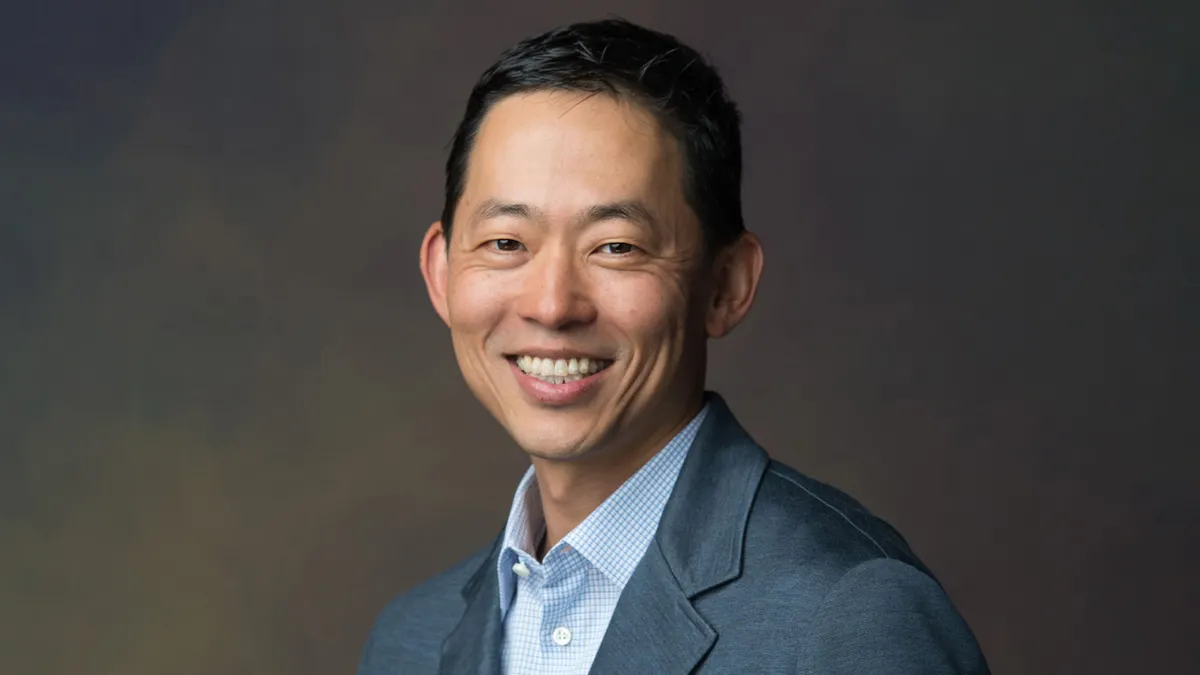 A headshot of David Ko, CEO of Calm