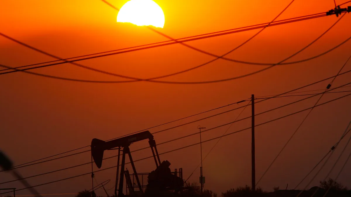 Oil rigs at sunset