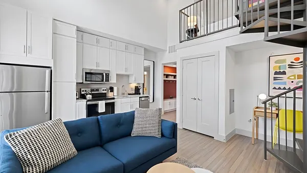 The interior of an apartment-style hotel room.