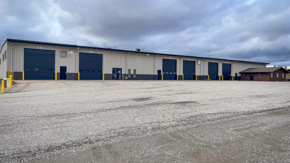 Bay doors of a new property that Palmer Trucks is leasing for a dealership and service center.