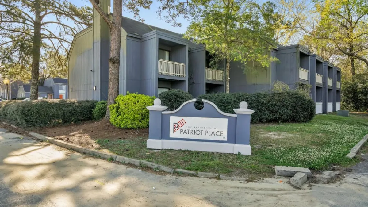 Exterior picture of two-story garden apartment property
