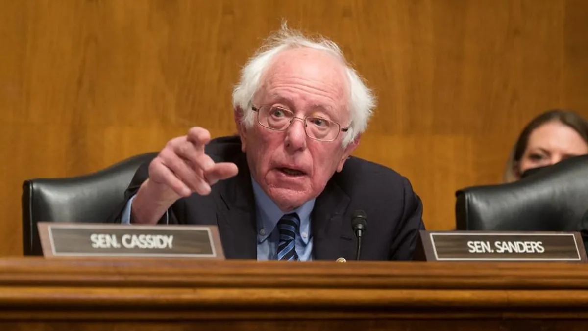 A close-up of Sen. Bernie Sanders speaking in Dirksen, a U.S. Senate building