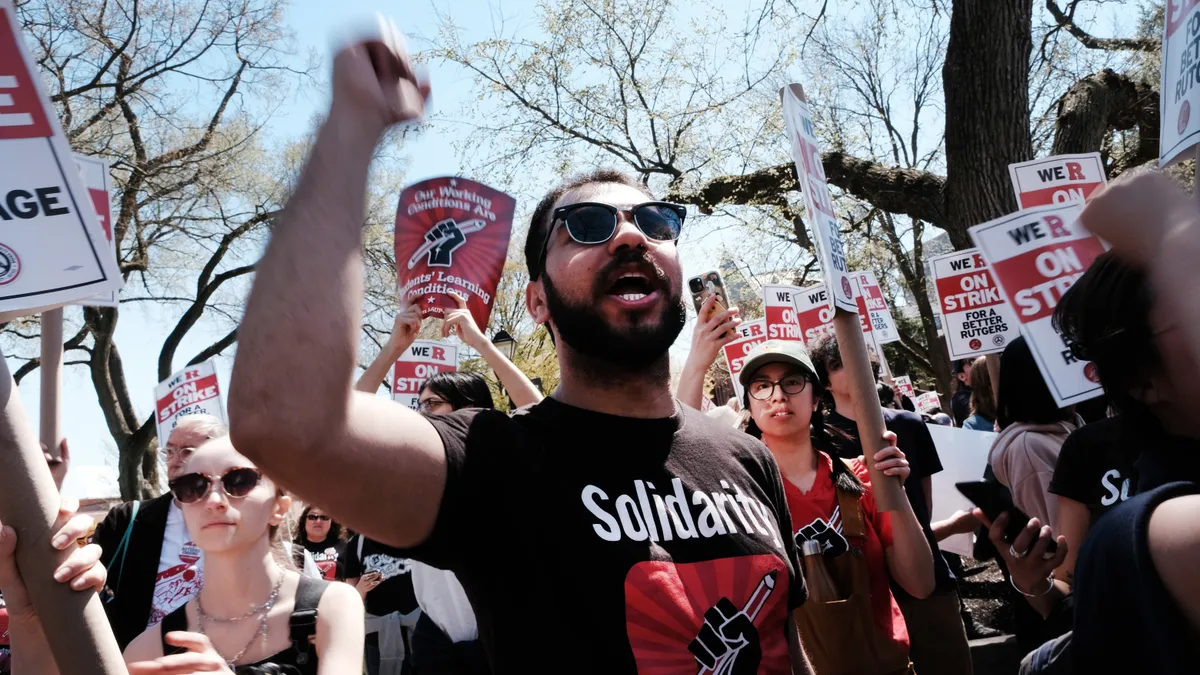 Rutgers students and faculty participate in a strike at the university's main campus on April 10, 2023 in New Brunswick, New Jersey.