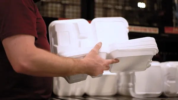 Handling styrofoam takeout container
