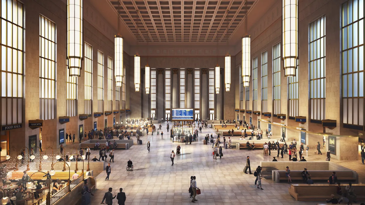 A rendering of a large train hall with people moving to and from sections. The concourse is brightly lit and maintains an old train hall aesthetic.