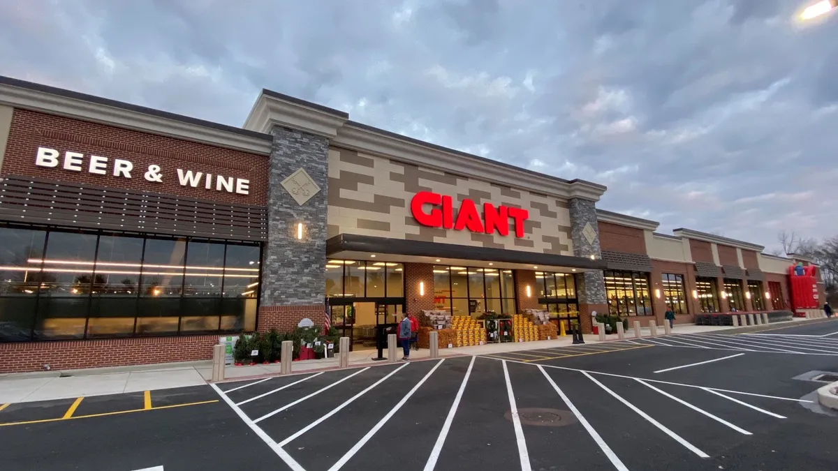 Exterior of a store with a large red lettering saying "Giant."