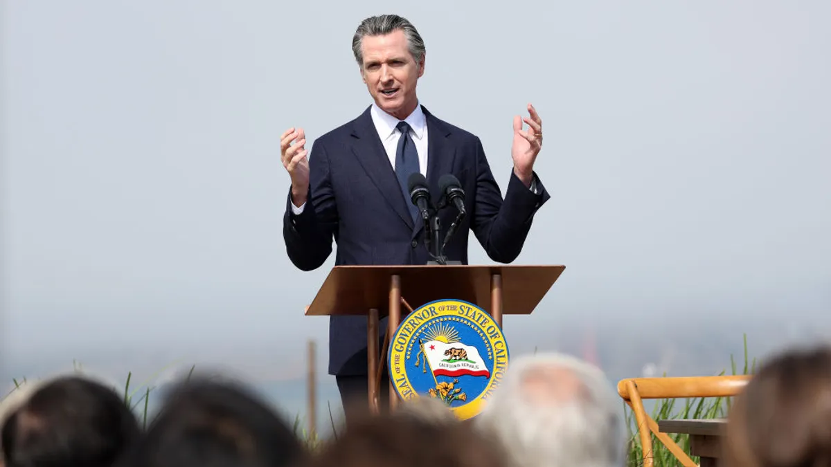 California Gov. Gavin Newsom talks during a news conference in October 2022.