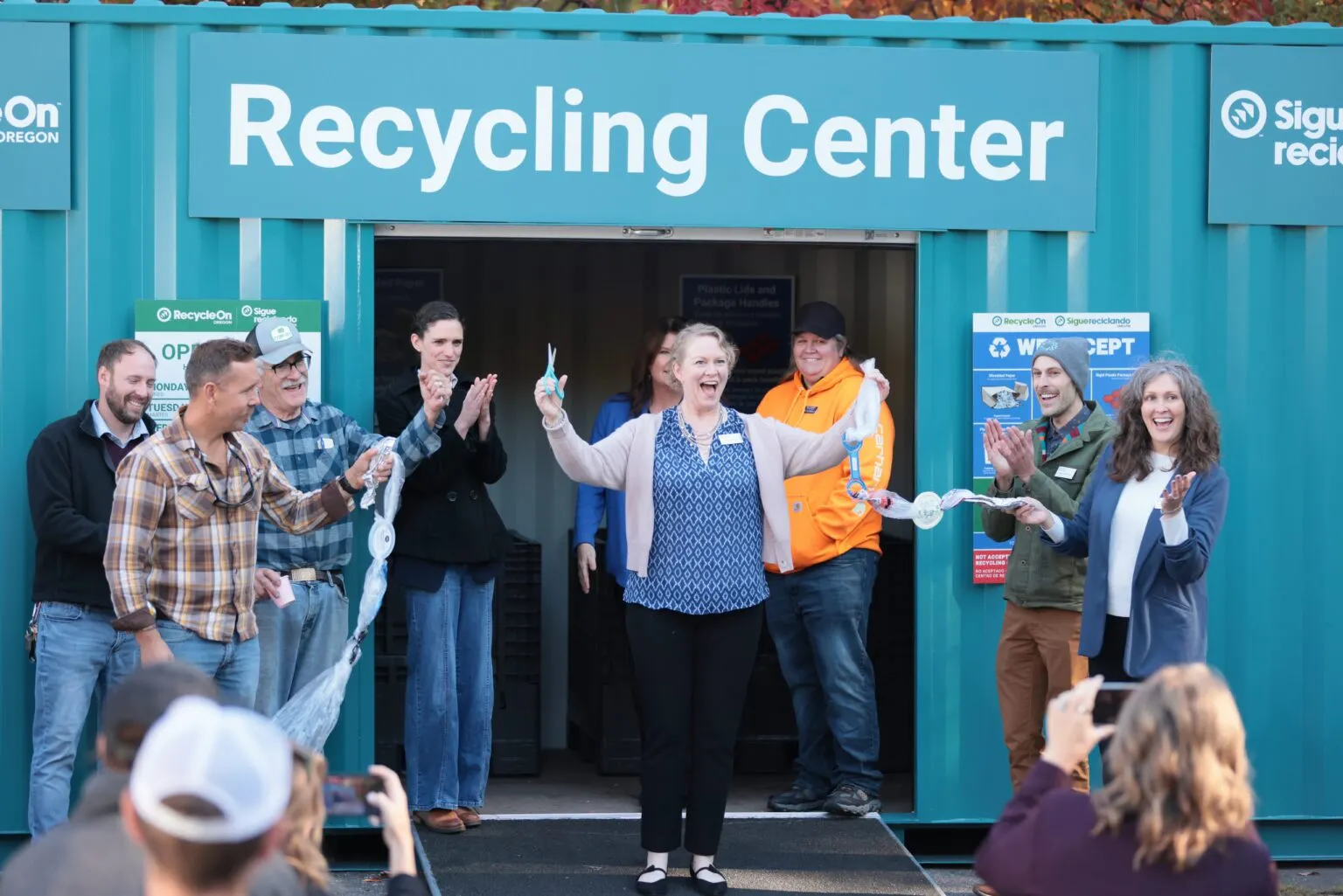 CAA Oregon RecycleOn Center Manager, Marisa Craft, cutting the “ribbon” when opening the first center in Ashland in October 2025.