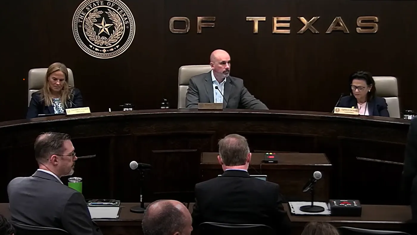 Public Utility Commission of Texas Chairman Thomas Gleeson leads a discussion of the state's pause of new data center interconnections with officials from the Electric Reliability Council of Texas at an Aug. 20, 2026, open meeting.