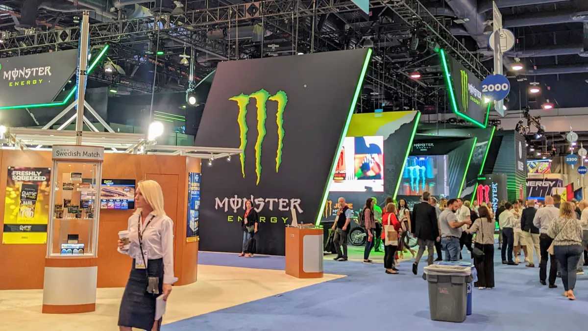 A busy NACS Show floor featuring Monster Energy drink booth