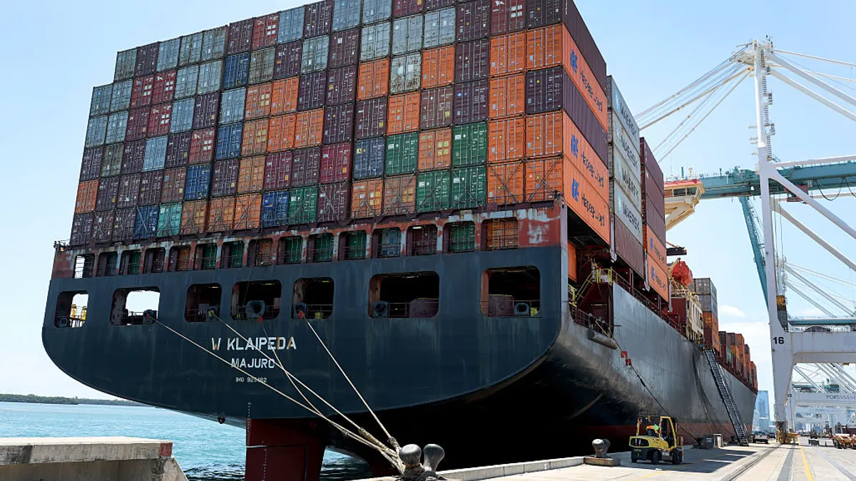 Shipping containers are stacked on a cargo ship as they are offloaded at PortMiami on April 15, 2025 in Miami, Florida.