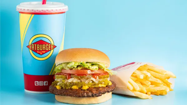 A photograph of a burger, drink and fries from Fatburger.