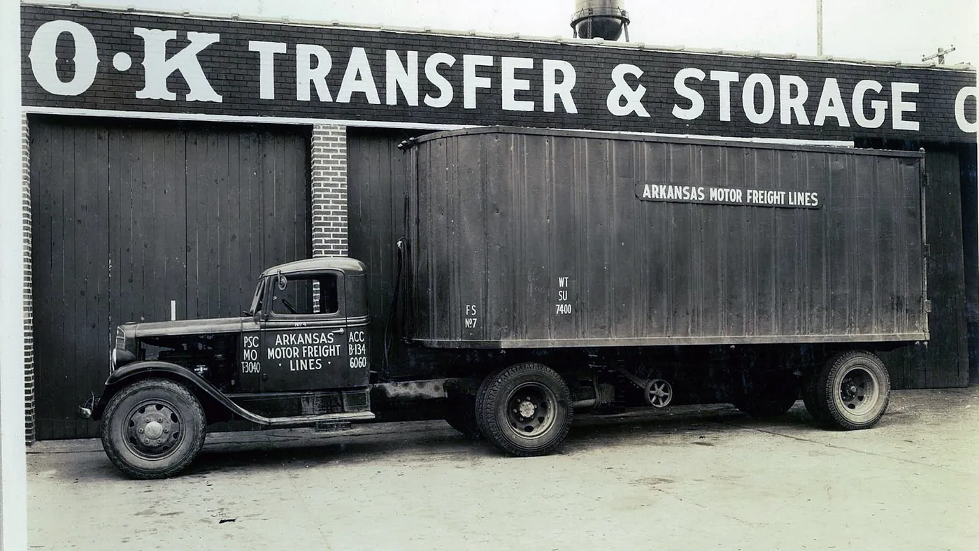 An Arkansas Motor Freight Lines truck at a transfer and storage facility in a 1935 photograph.