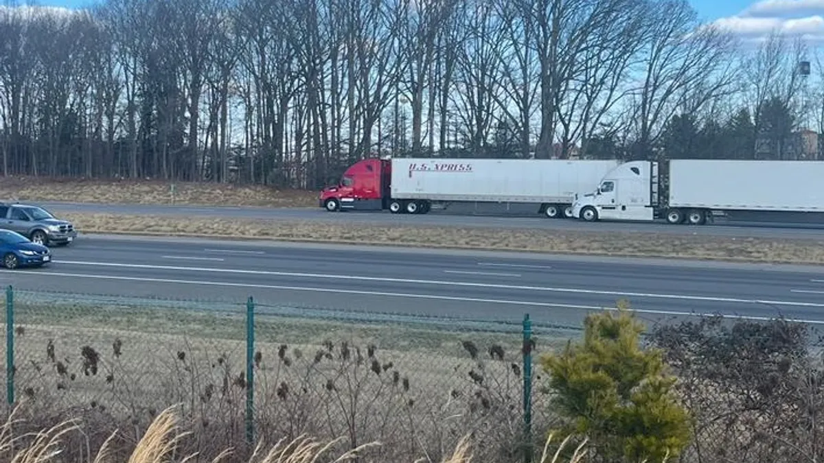 A U.S. Xpress truck drives northbound on I-95 in Virginia in January 2023.