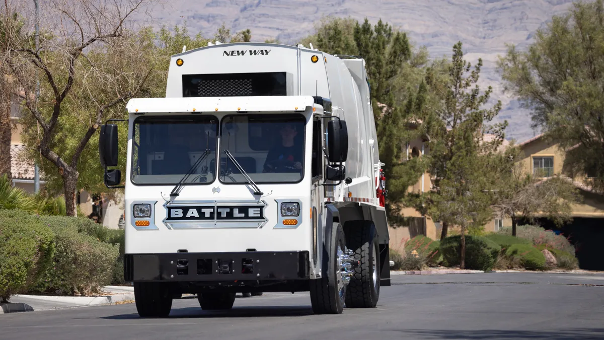 A Battle Motors truck on the road.