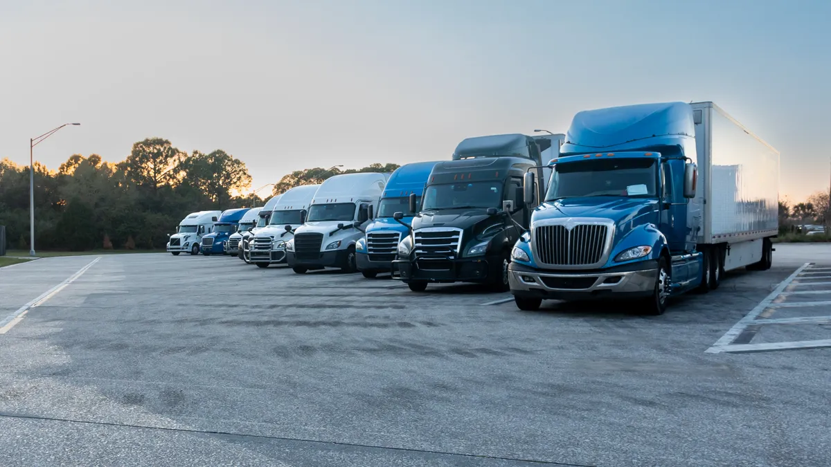 Trucks in a parking lot.