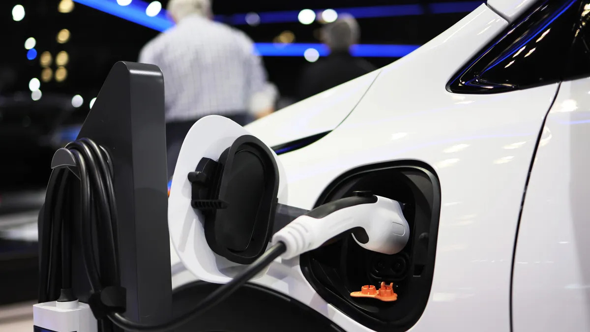 A charging Chevrolet Bolt EV is seen at the New York International Auto Show at the Jacob K. Javits Convention Center on April 15, 2022 in New York City.