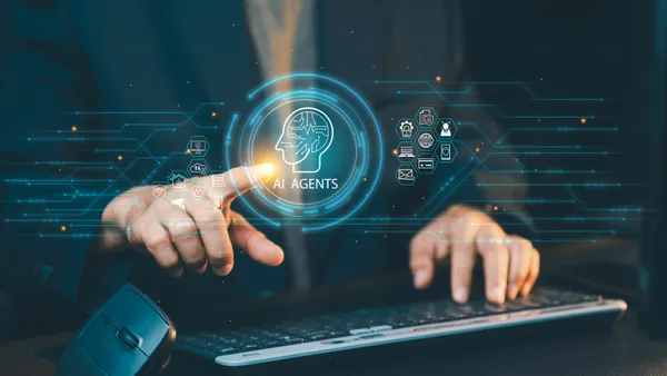 Businessman typing on keyboard and pointing at virtual AI agents screen interface, showcasing smart business automation, data analysis, and advanced machine learning.