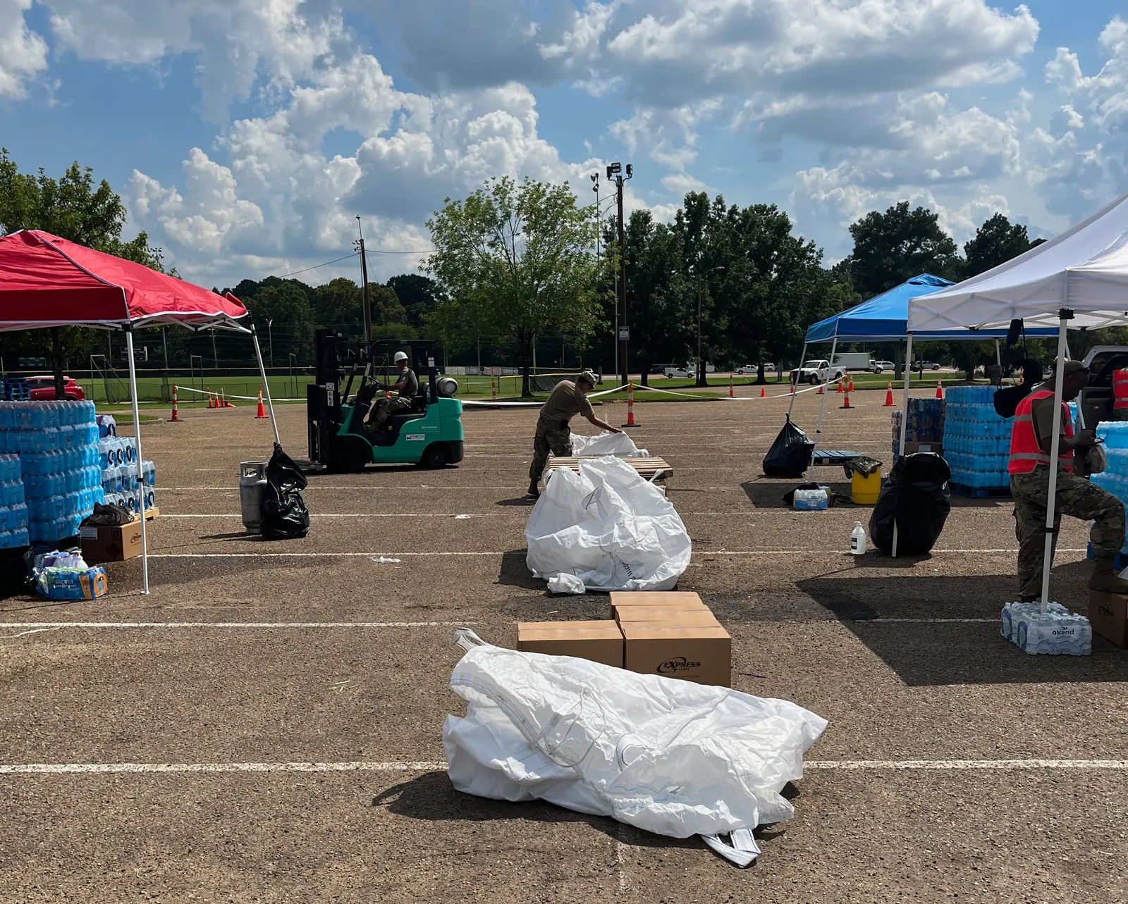 Water bottle collection sacks at a site in Jackson, Mississippi.