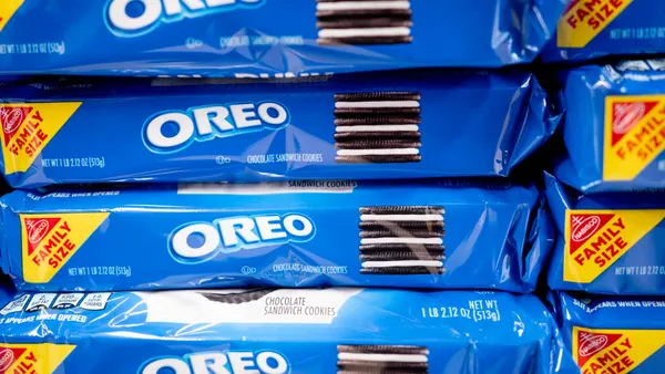 Packages of Oreo Cookies on a grocery store shelf.
