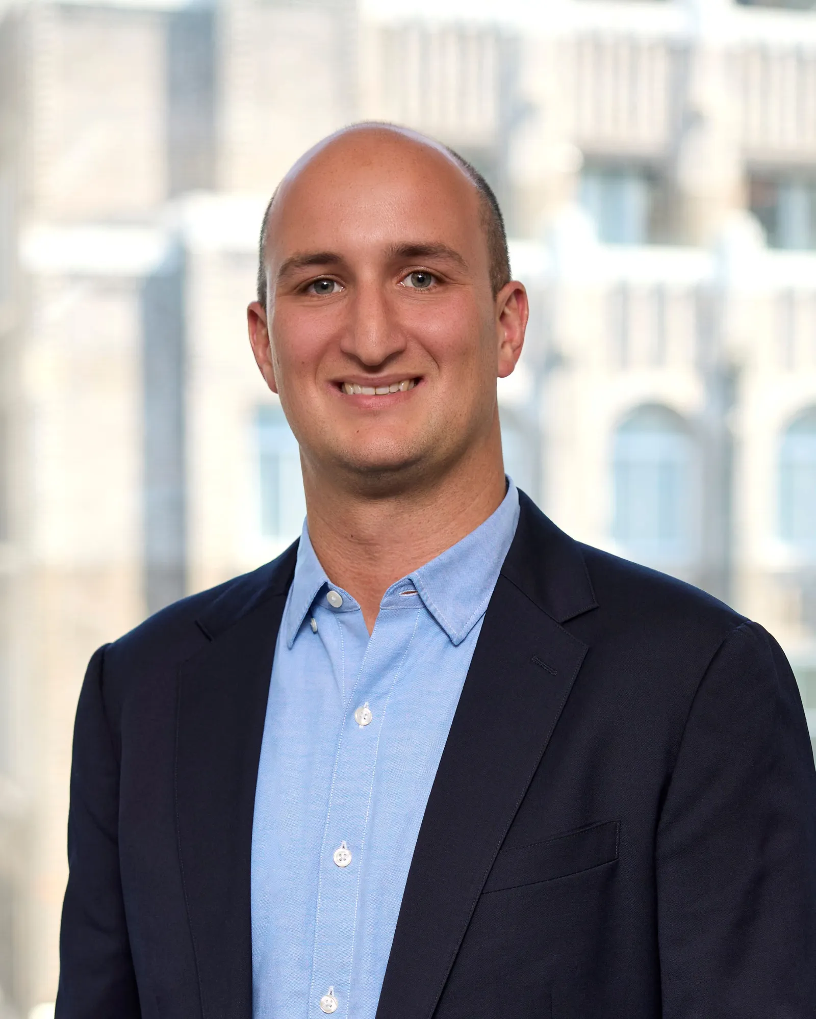 A headshot of Daniel Schachne.