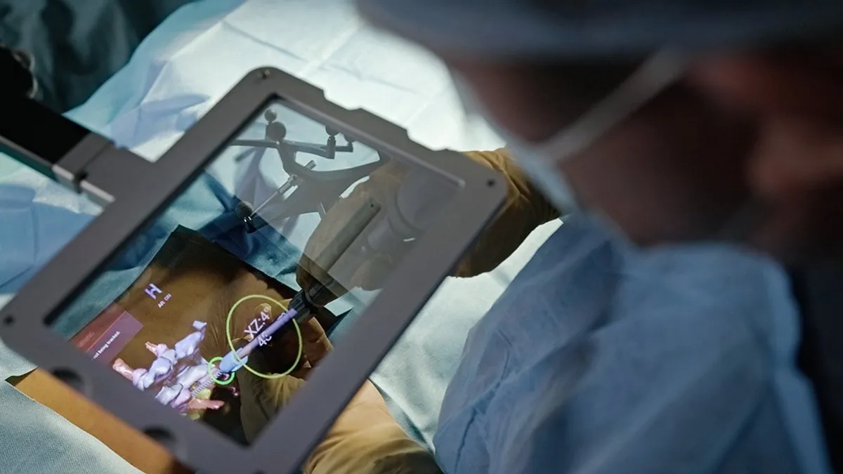 HOLO Portal surgical guidance system incorporates HOLO AI technology with a unique augmented reality (AR) interface to enhance intraoperative image-guided navigation with AI driven insights.