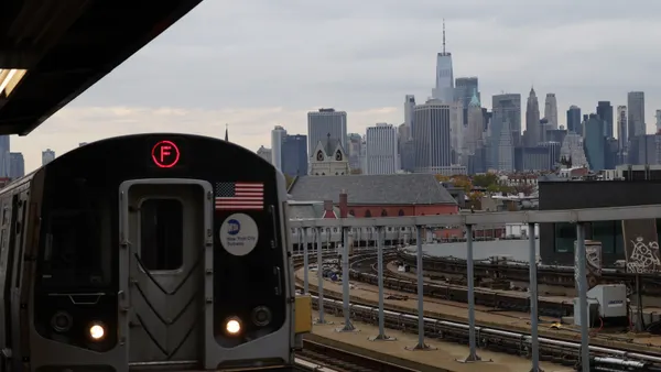 subway arrives at a Brooklyn station