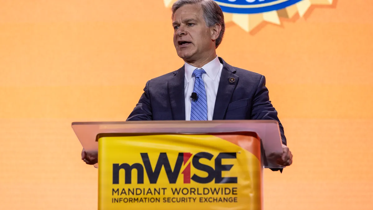 FBI Director Chris Wray addresses the 2023 mWISE Conference from Mandiant.