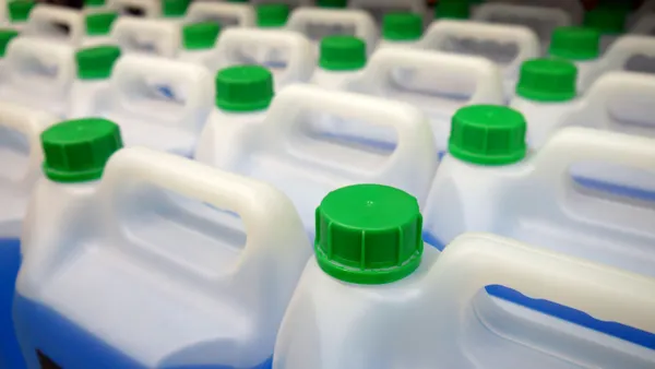 Plastic jerrycans containing antifreeze.