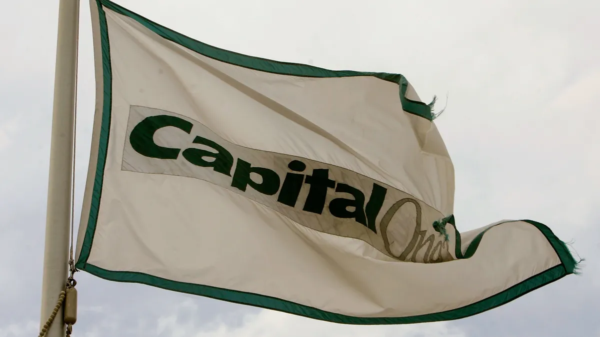 The Capital One flag flies over its headquarters March 13, 2006 in Mclean, Virginia.