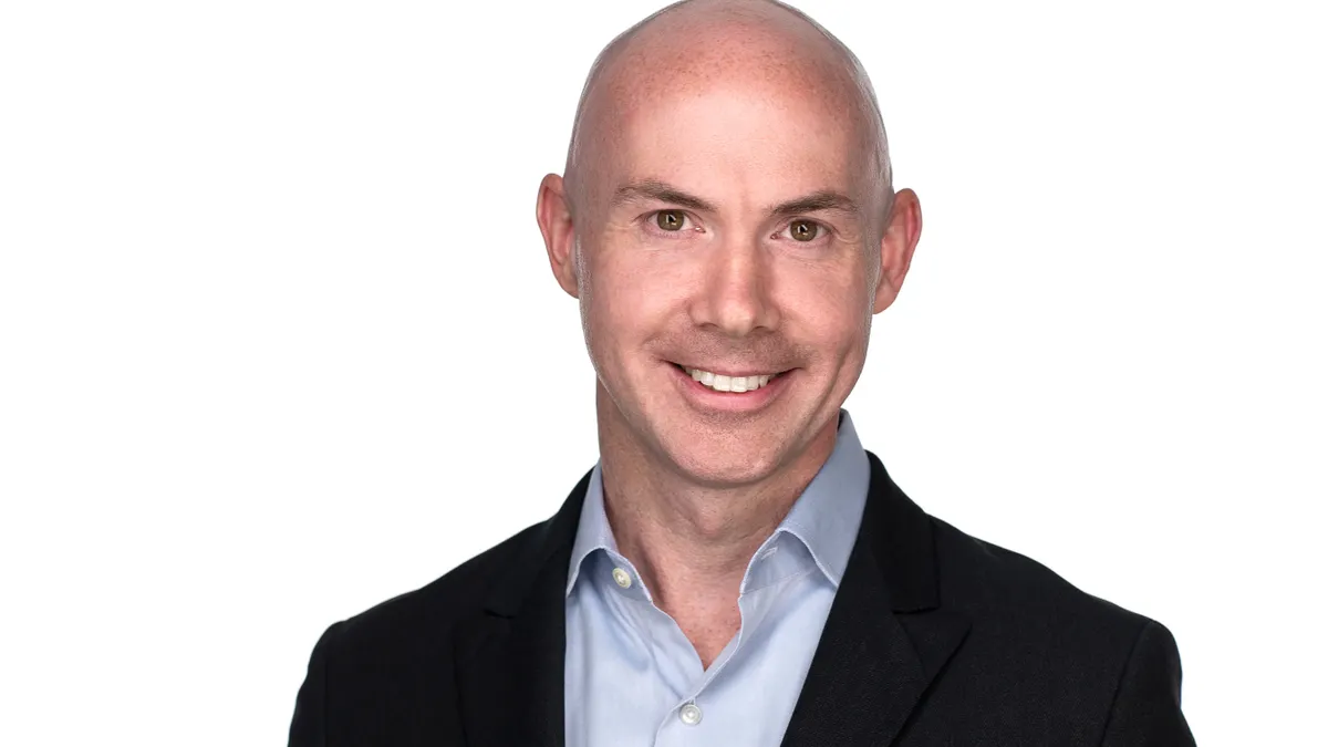 A headshot of Motif FoodWorks CEO Michael Leonard