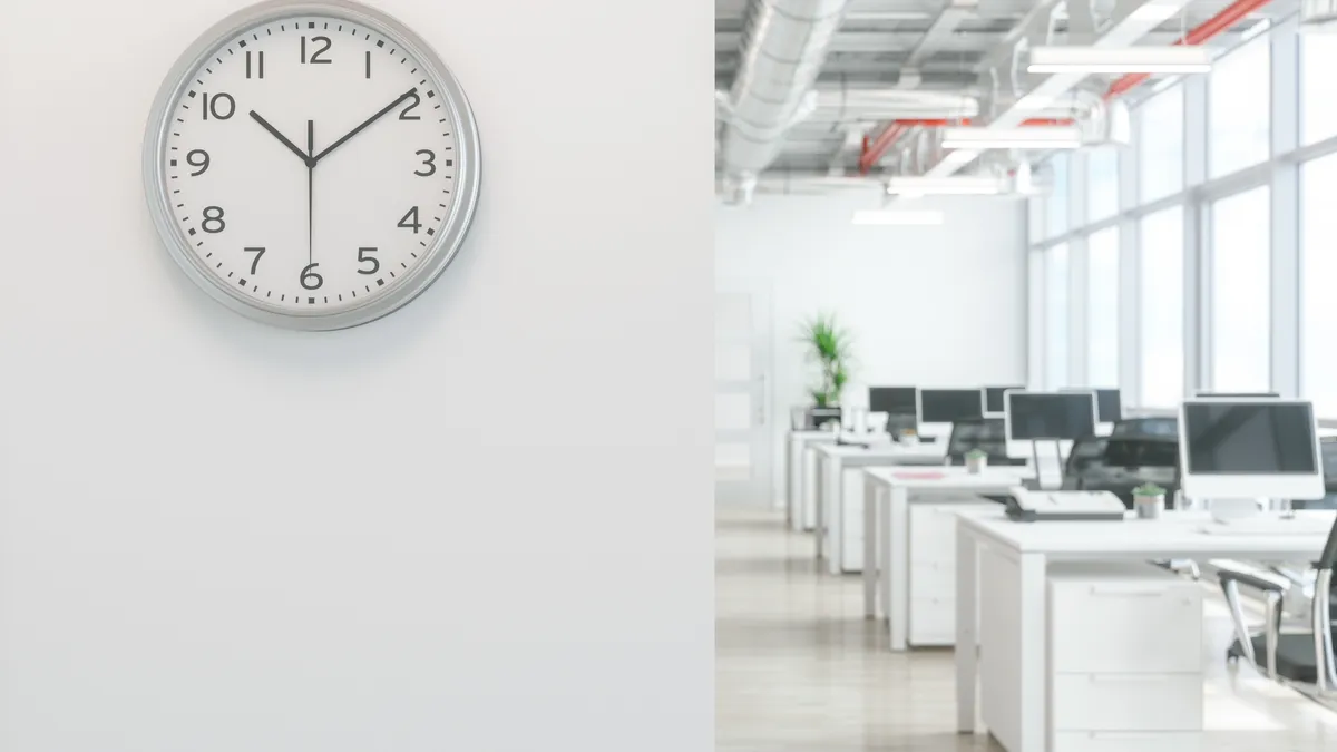 Clock on white wall in Office