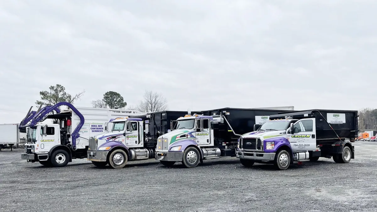 Parked waste truck fleet