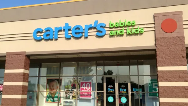 A Carter's Babies and Kids storefront with a blue sky