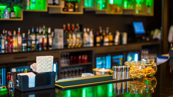 A luxury cocktail bar counter at night