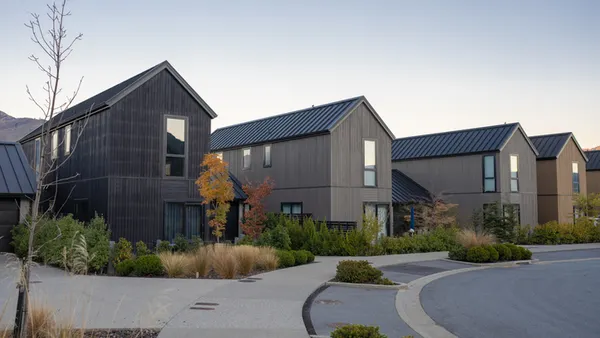 a row of brown townhouses