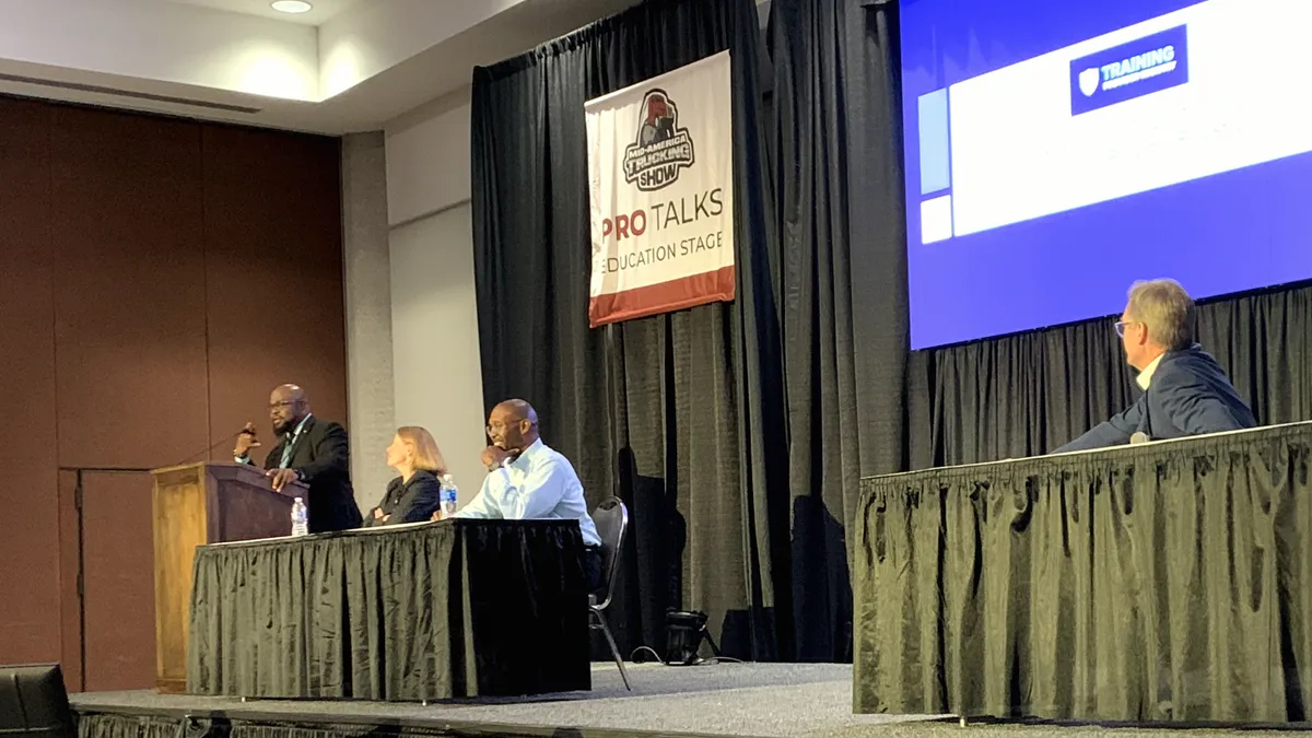 FMCSA officials on stage at the Pro Talks Theater at the Mid-America Trucking Show in Louisville, Kentucky, on March 22, 2024.