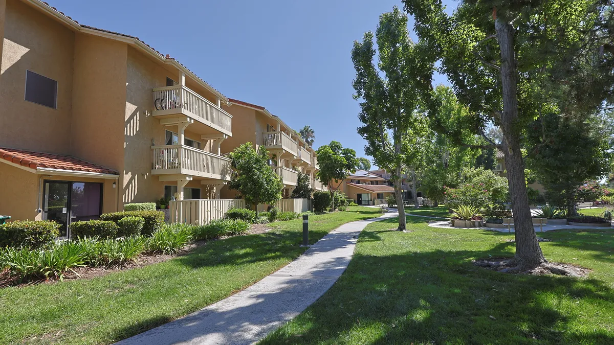 Brown, brick garden-style apartments