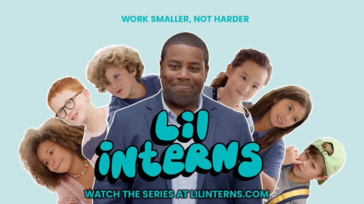 SNL actor Kenan Thompson is flanked by elementary school students against a blue backdrop to promote Old Navy's news "Lil Interns" series.