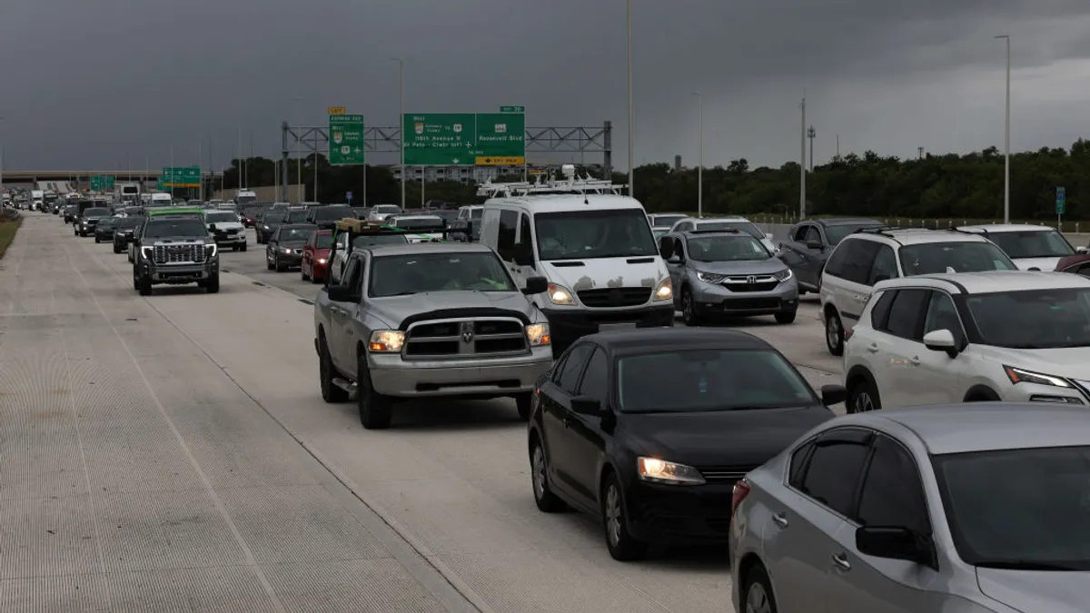 Cars on a crowded highway.