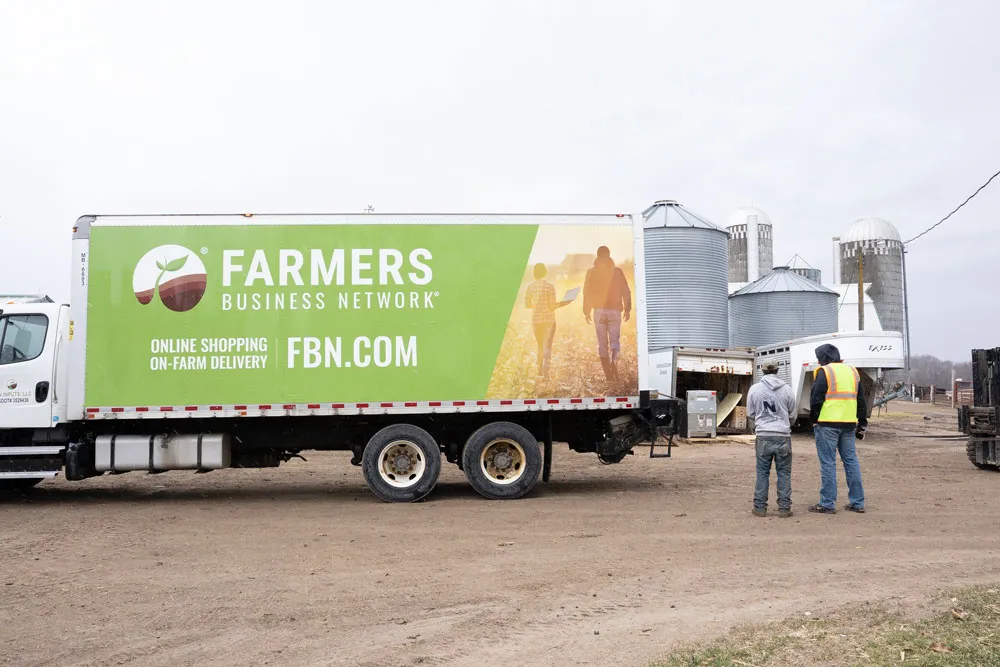 A Farmers Business Network truck makes a delivery.