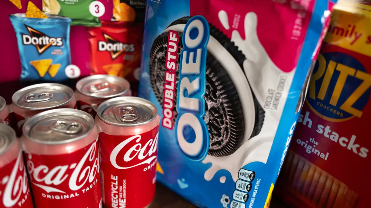 Coca-Cola, Oreo and Doritos products are seen