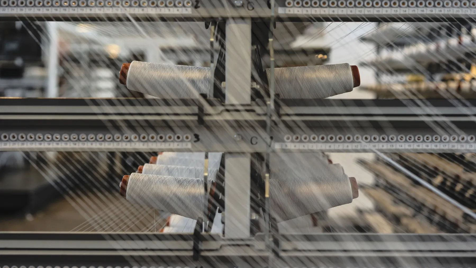 Spools of thread on a weaving machine