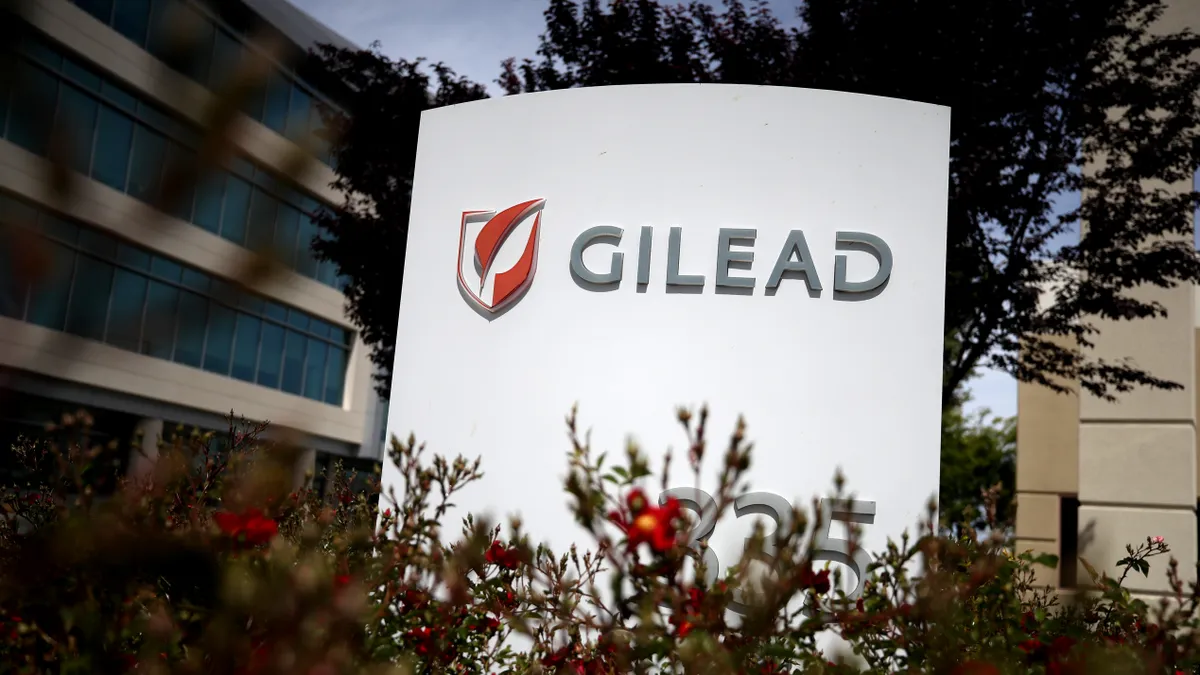 A sign showing Gilead's logo