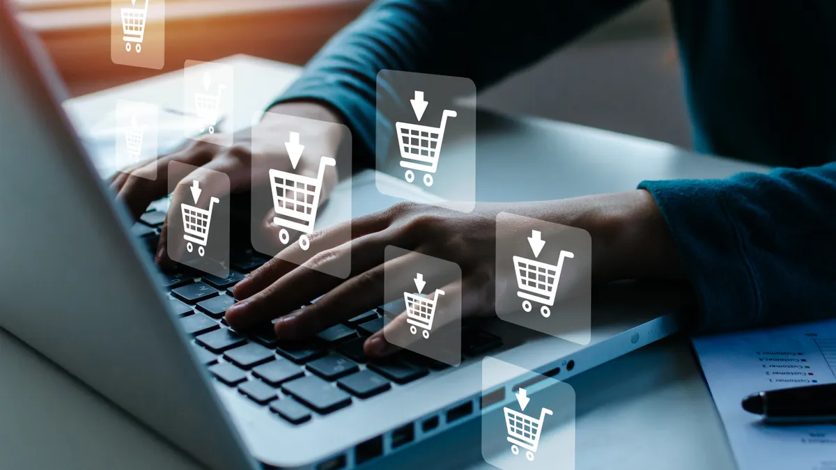 A photo of a person typing at a laptop with logos of shopping carts floating around it