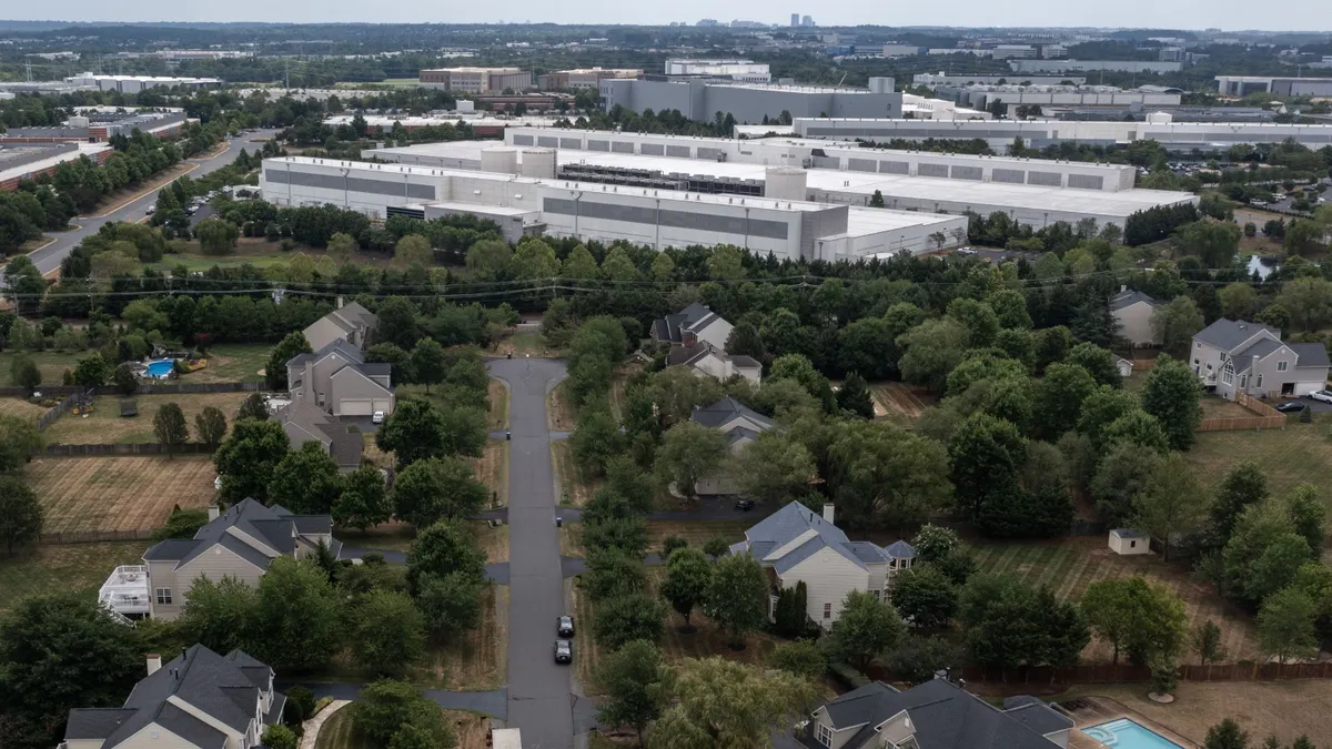 Homes site near data center buildings.