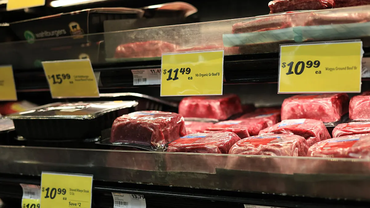Meat is on display on a grocery store's shelves
