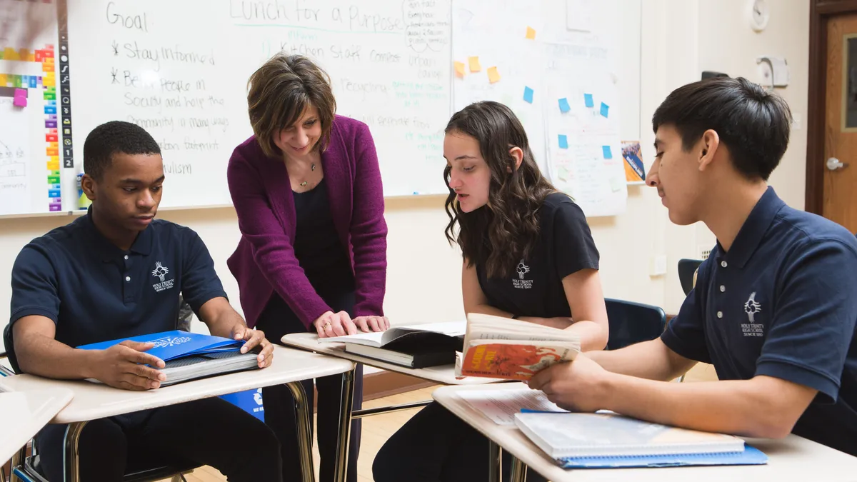 Teacher Angela Miceli with her students at Holy Trinity High School in Chicago, Illinois