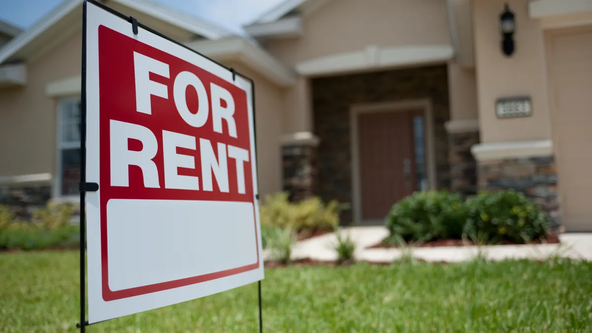 For Rent sign in front of new house